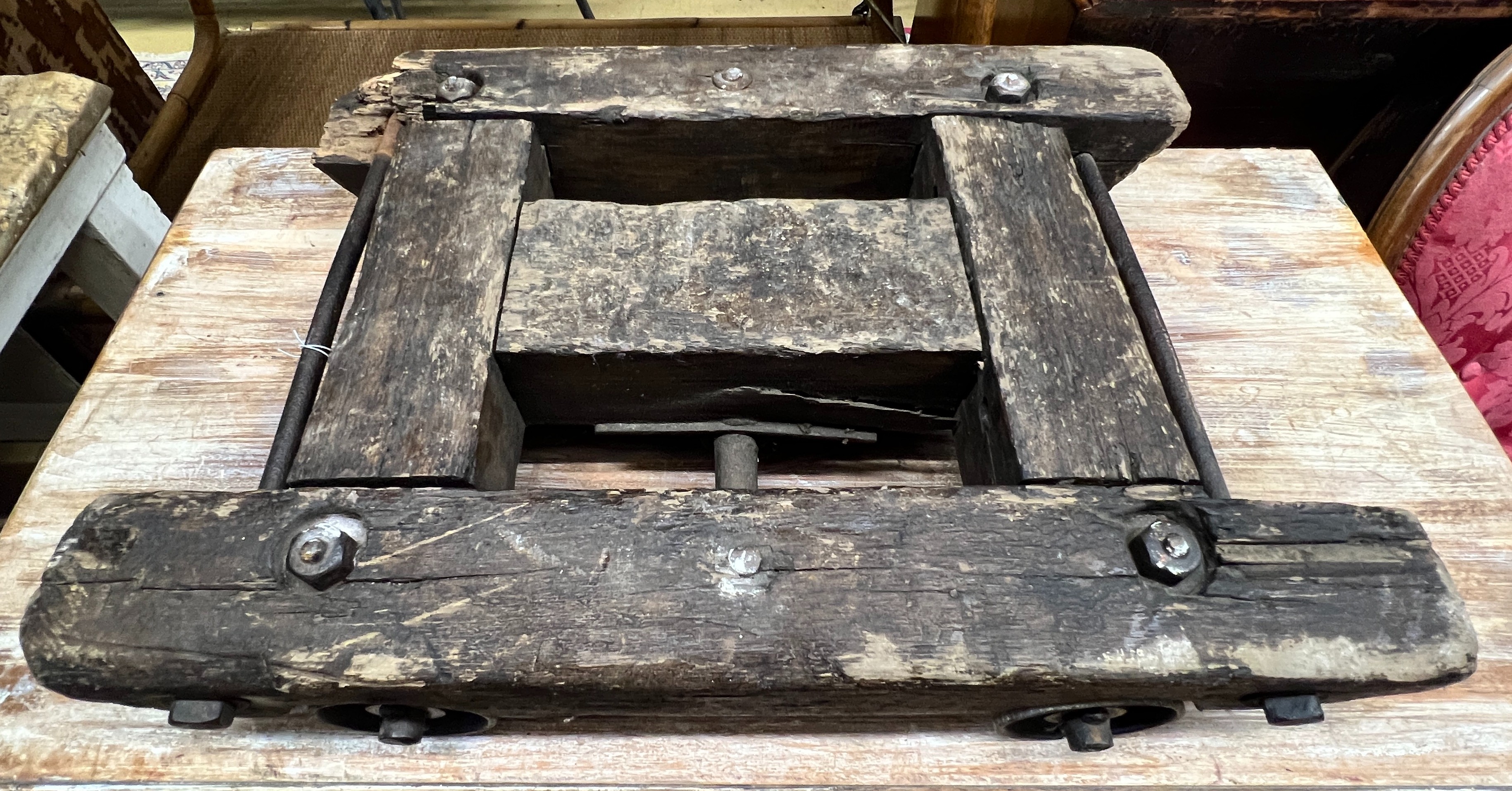 A vintage wooden trolley, width 40cm, length 57cm, height 12cm